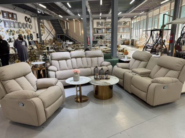 Grey three-seater sofa for living rooms and reception spaces